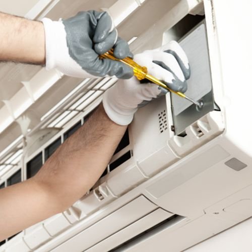 AC service by JJ Smart Services technician