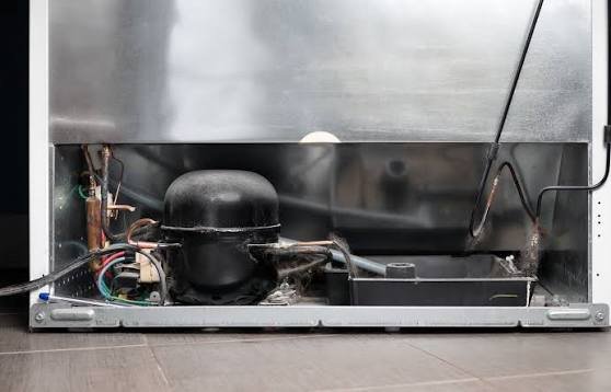 Fridge repair by JJ Smart Services technician