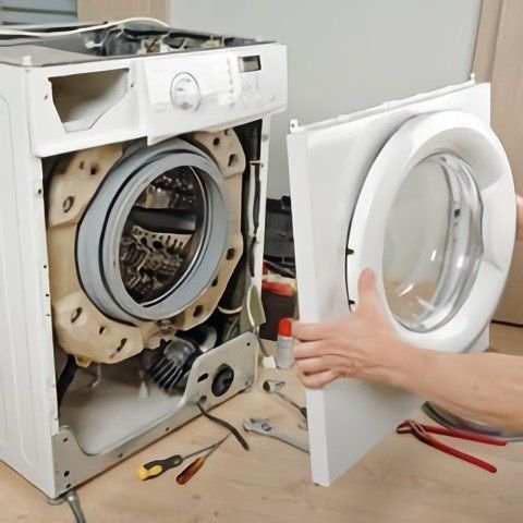 Washing machine repair by JJ Smart Services technician