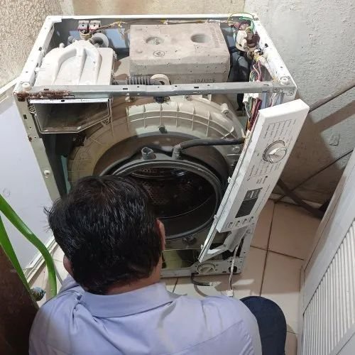 Washing machine repair by JJ Smart Services technician