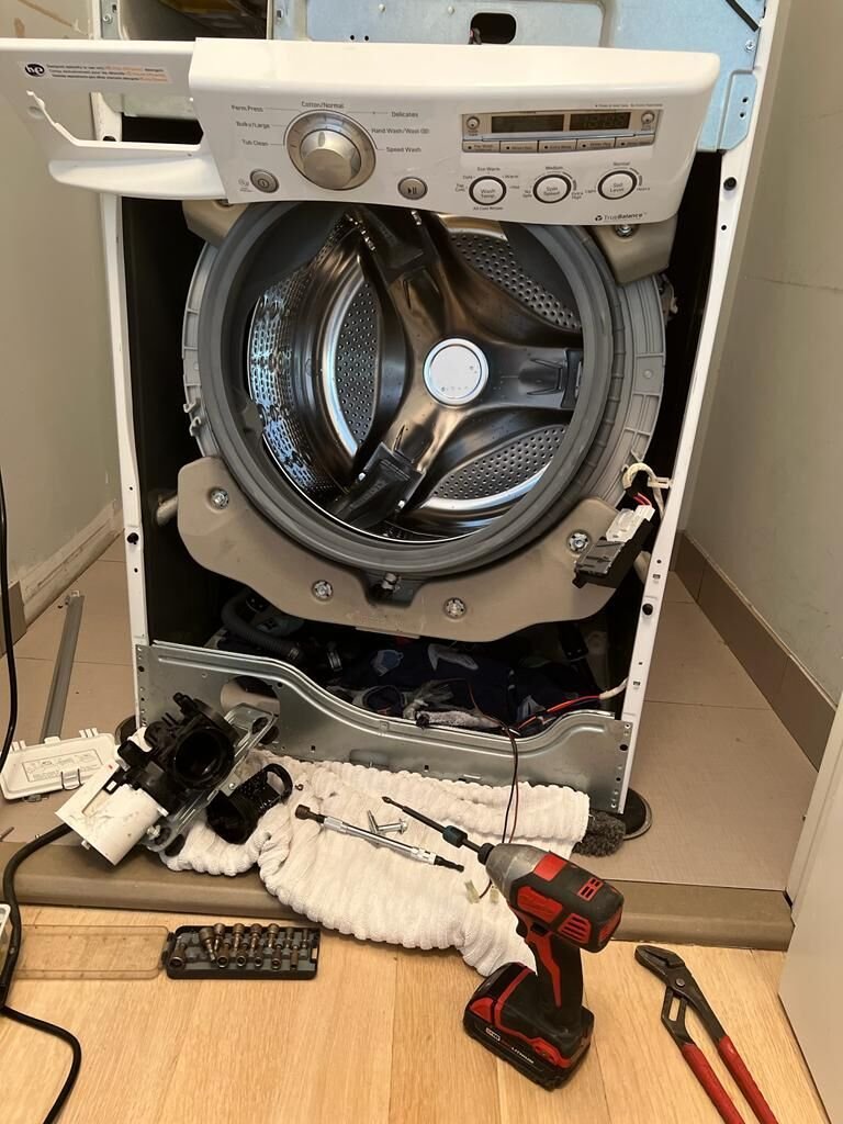 Washing machine repair by JJ Smart Services technician