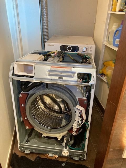 Washing machine repair by JJ Smart Services technician